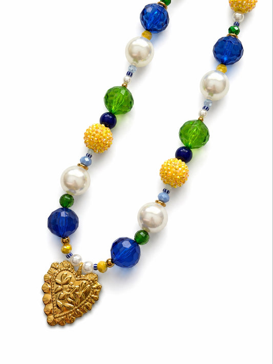 Lemon Heirloom statement necklace with cobalt blue, emerald green, yellow and pearl beads and ornate gold heart pendant