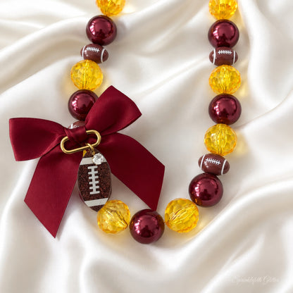 Game Day Fête Necklace with customizable football team colors and bow